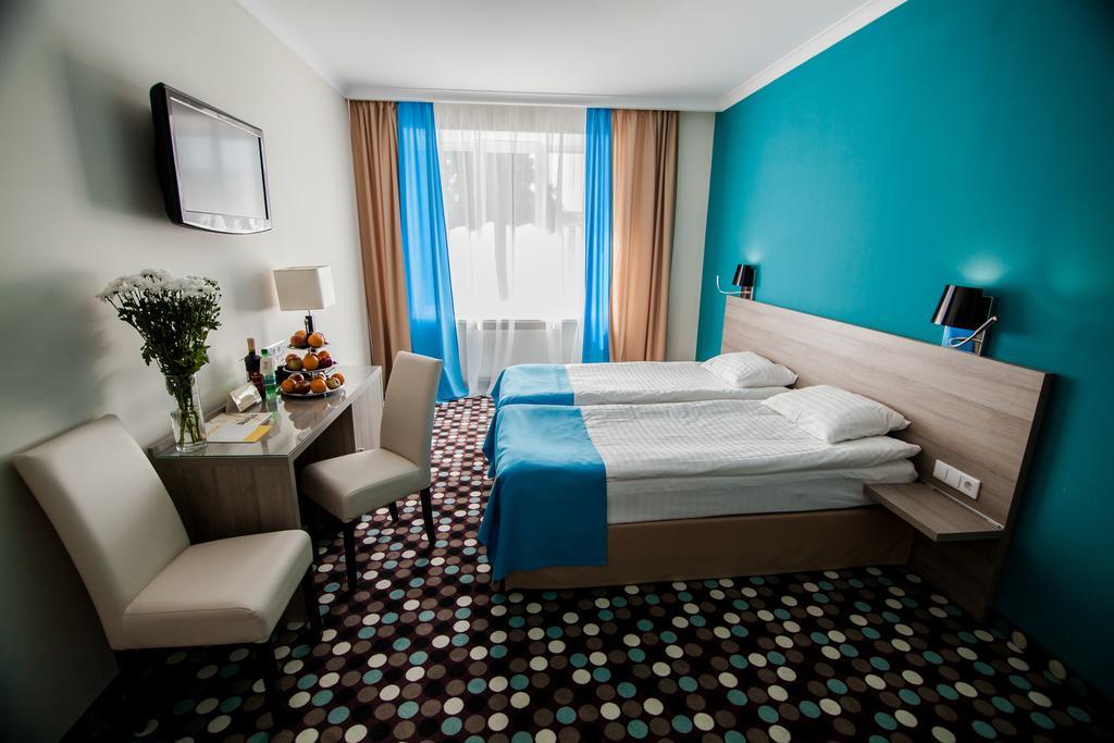 Optima Rivne Hotel Habitación foto